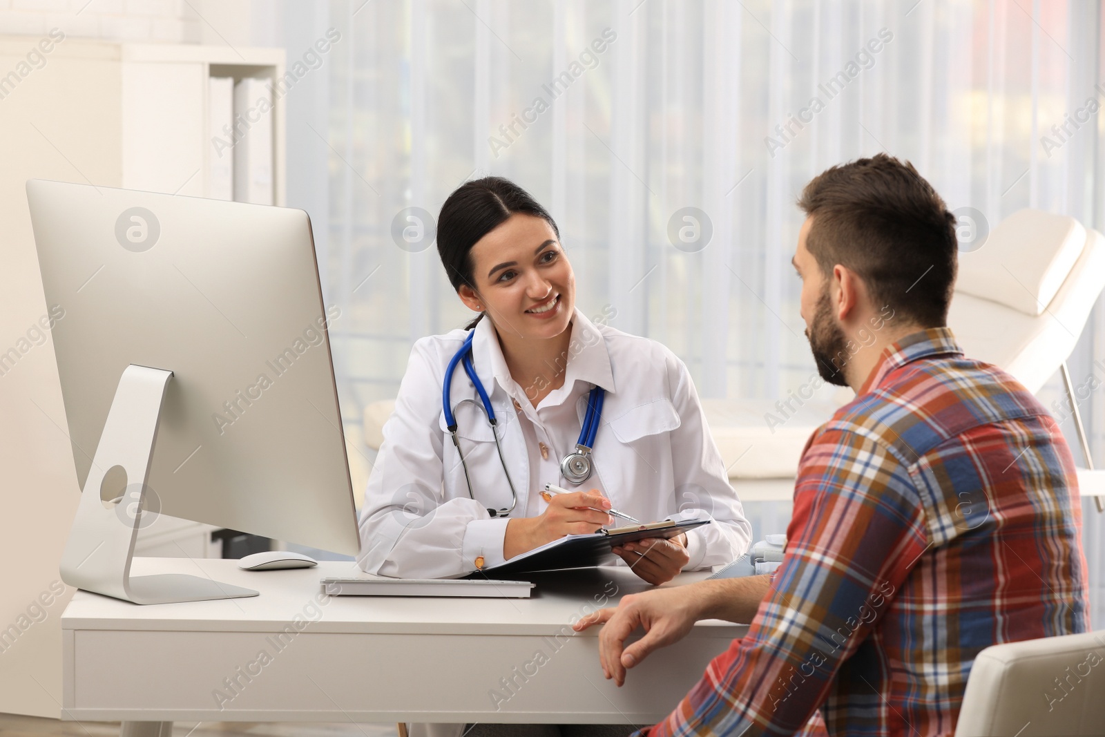 Photo of Man having appointment with neurologist in clinic