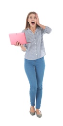 Emotional young woman with laptop celebrating victory on white background