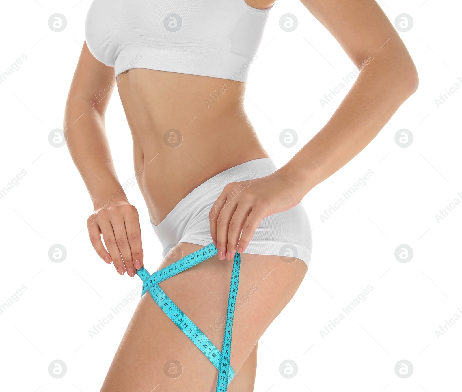 Photo of Beautiful young woman with measuring tape on white background. Healthy diet