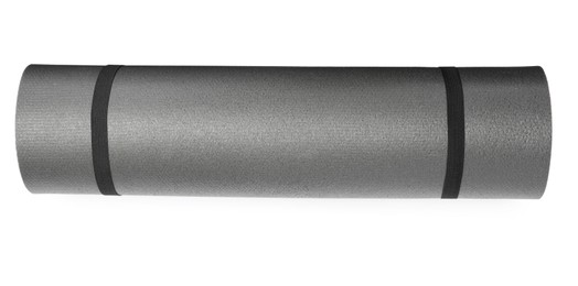 Photo of Grey rolled camping or exercise mat on white background, top view