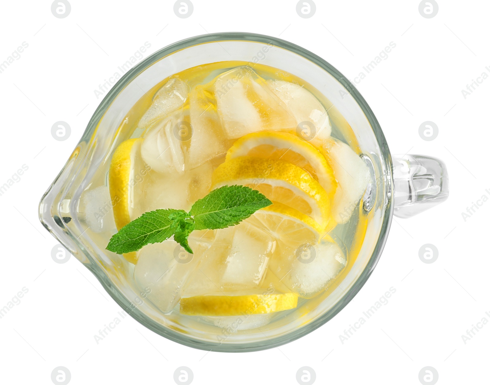 Photo of Glass jug with natural lemonade on white background, top view