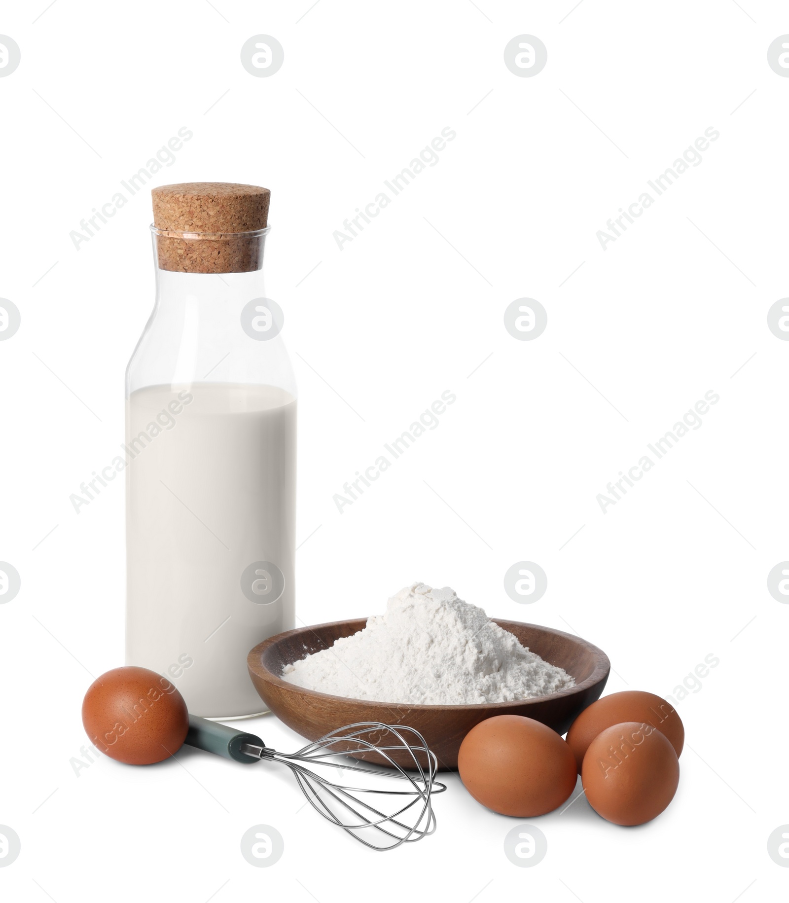 Photo of Whisk, raw eggs, flour and bottle of milk isolated on white