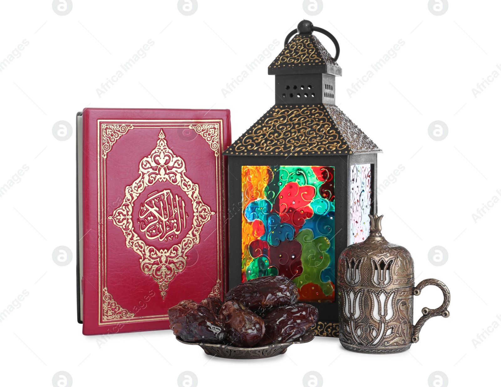 Photo of Decorative Arabic lantern, Quran, dates and coffee on white background