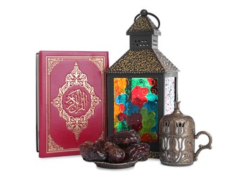 Photo of Decorative Arabic lantern, Quran, dates and coffee on white background