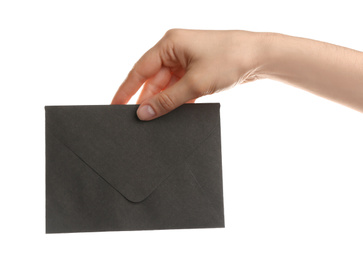 Photo of Woman holding black paper envelope on white background, closeup