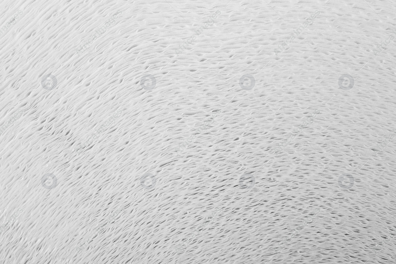 Photo of Macro view of toilet paper roll as background. Personal hygiene