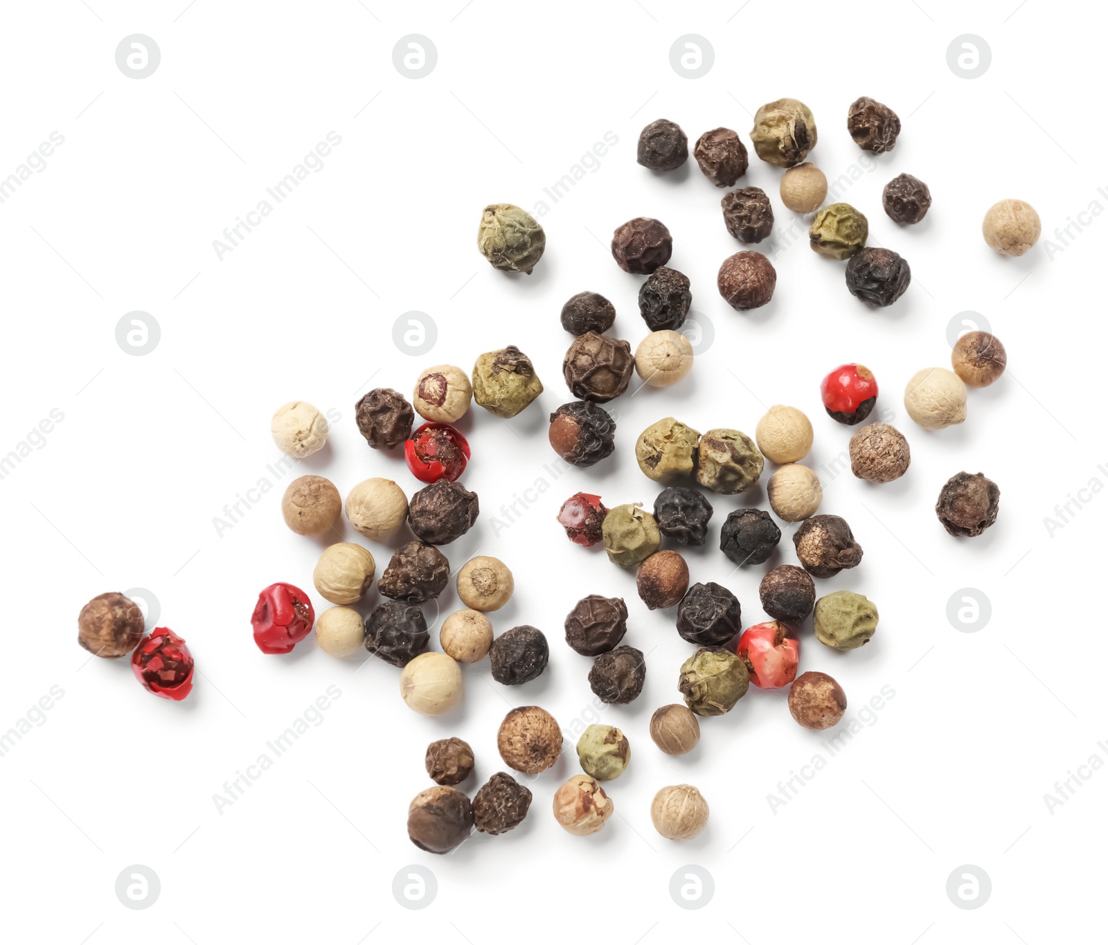 Photo of Aromatic spices. Pile of different peppers isolated on white, top view