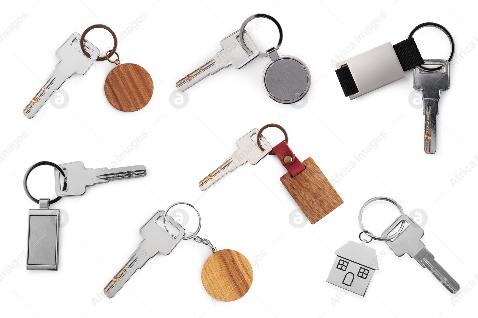 Image of Set of keys with key chains isolated on white