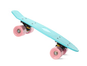 Photo of Turquoise skateboard with pink wheels isolated on white