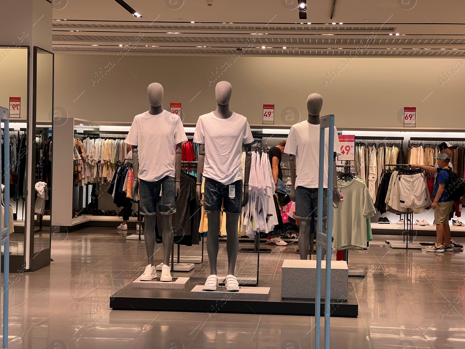 Photo of WARSAW, POLAND - JULY 13, 2022: Stylish interior of fashion store in shopping mall