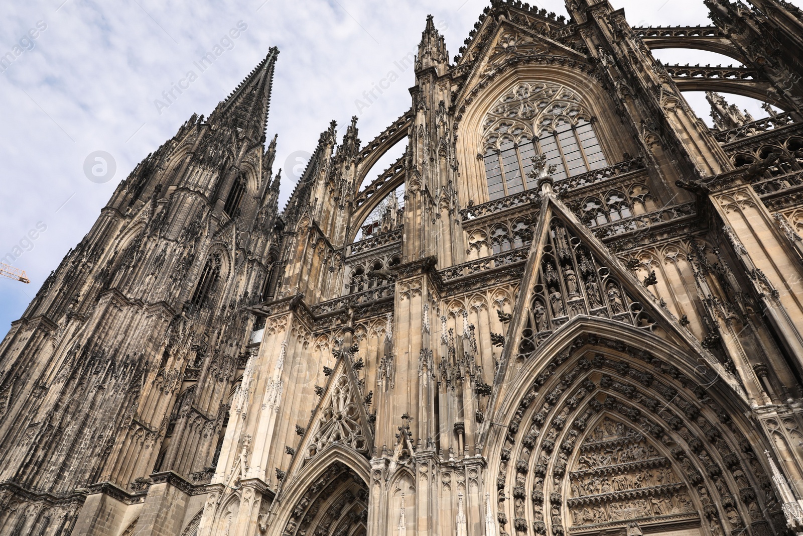 Photo of Cologne, Germany - August 28, 2022: Beautiful old gothic cathedral against blue sky