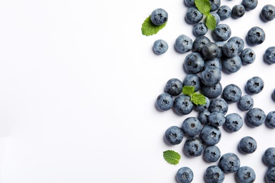 Photo of Flat lay composition with tasty blueberry and space for text on white background