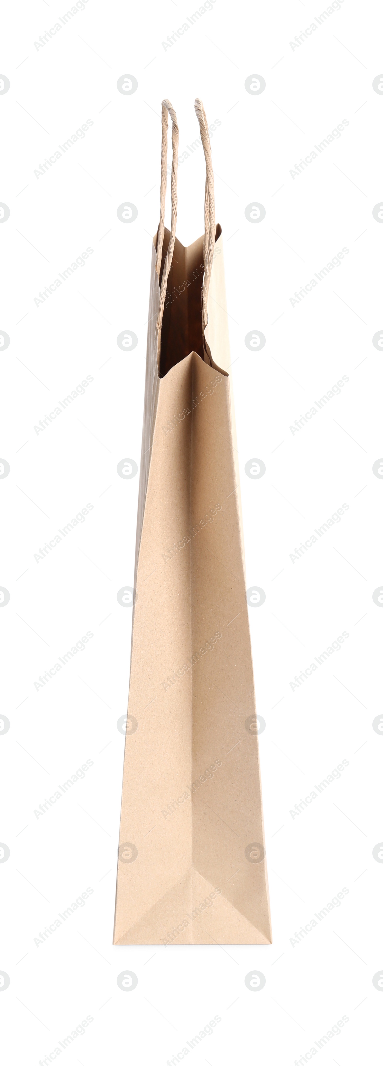 Photo of One kraft paper bag isolated on white. Mockup for design