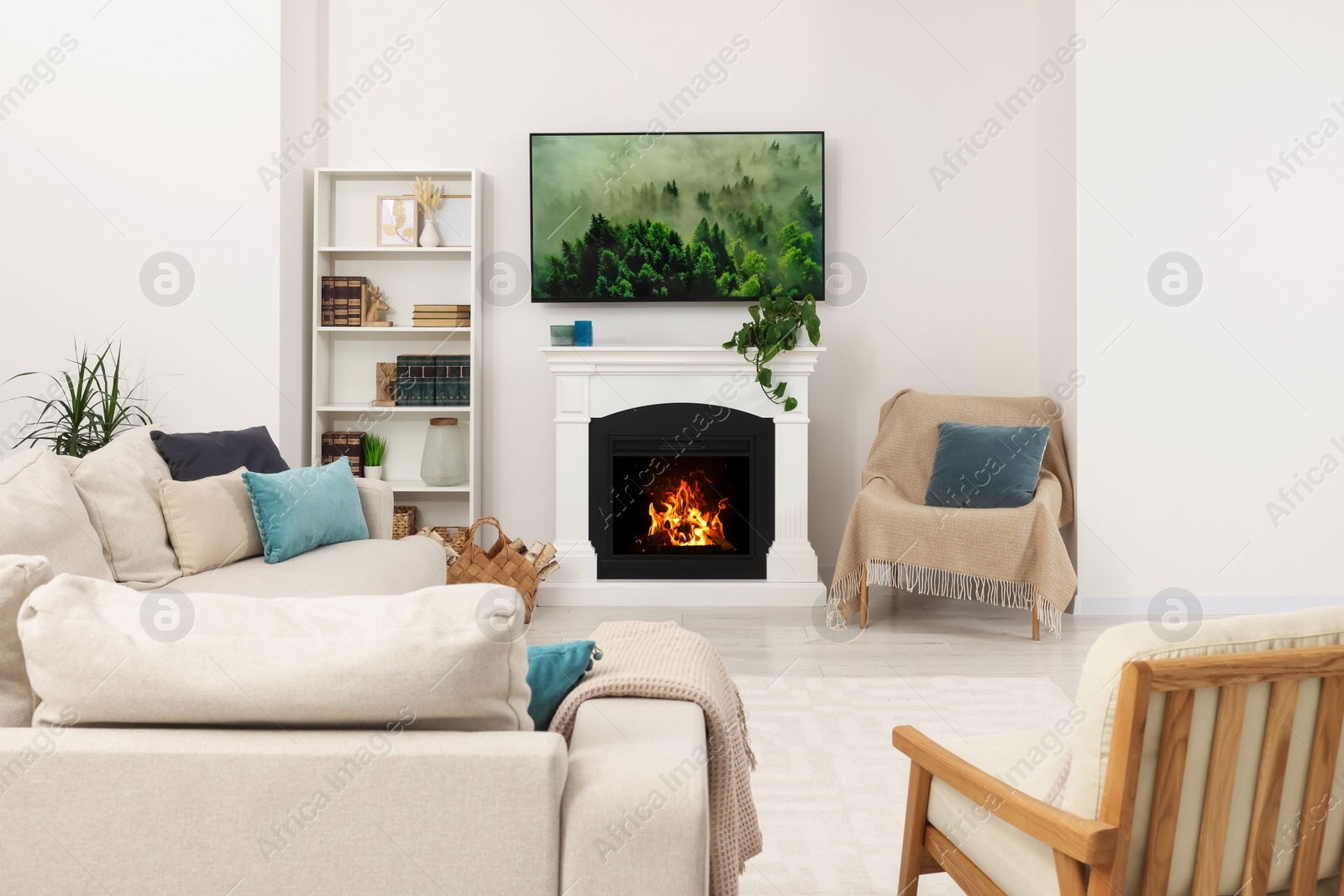 Photo of Stylish living room interior with cozy sofa, TV set and fireplace