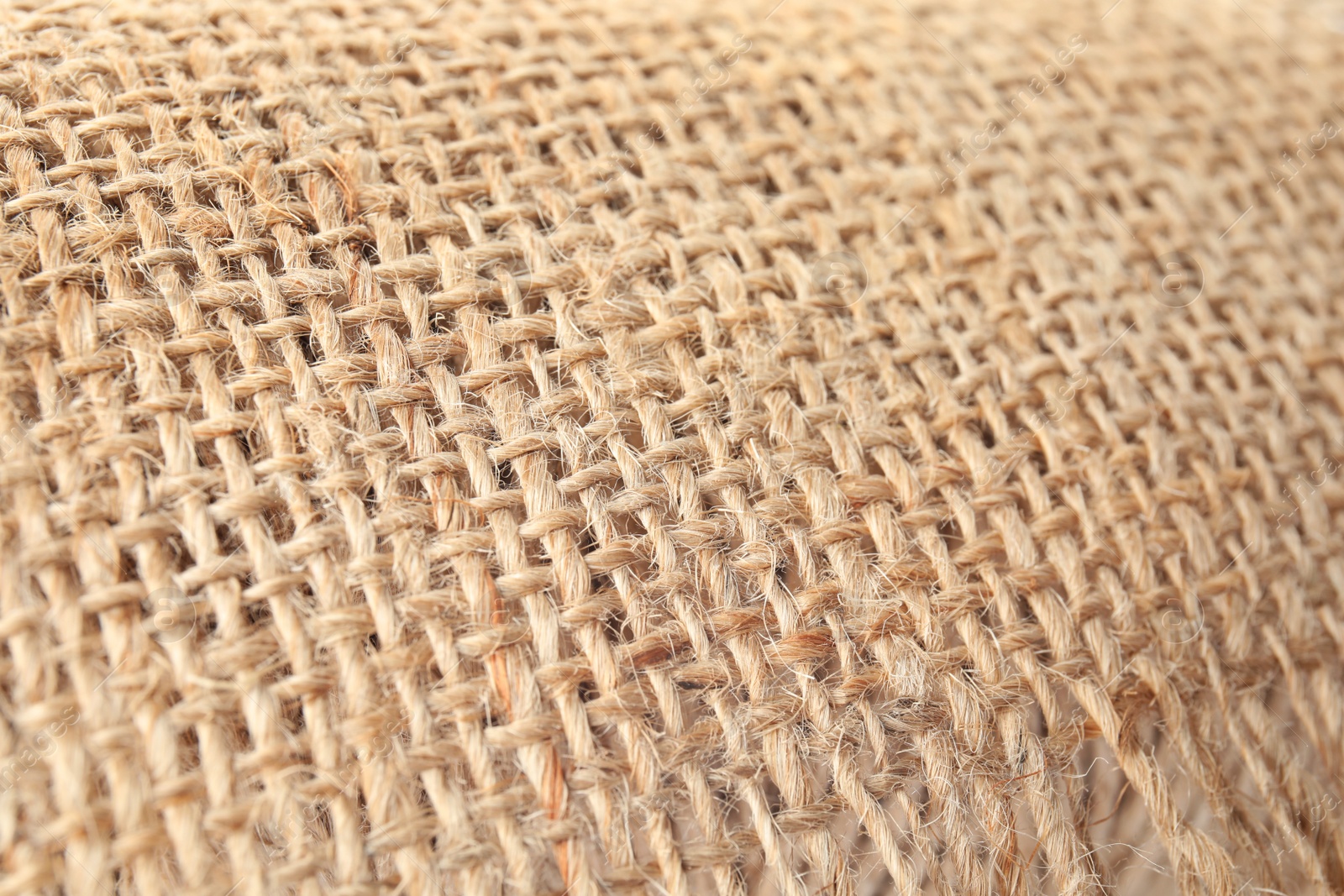 Photo of Texture of sustainable hemp fabric as background, closeup