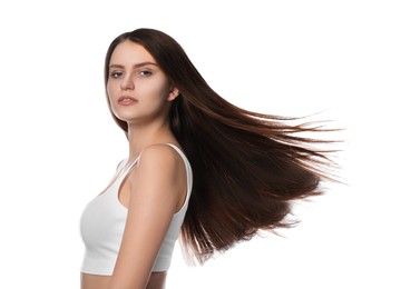Photo of Young woman with strong healthy hair on white background