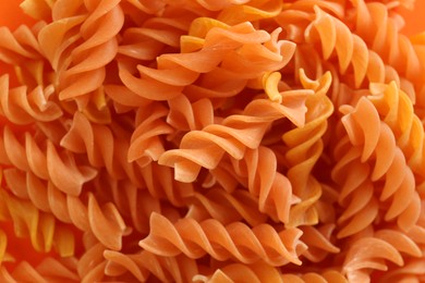 Tasty raw pasta as background, closeup view