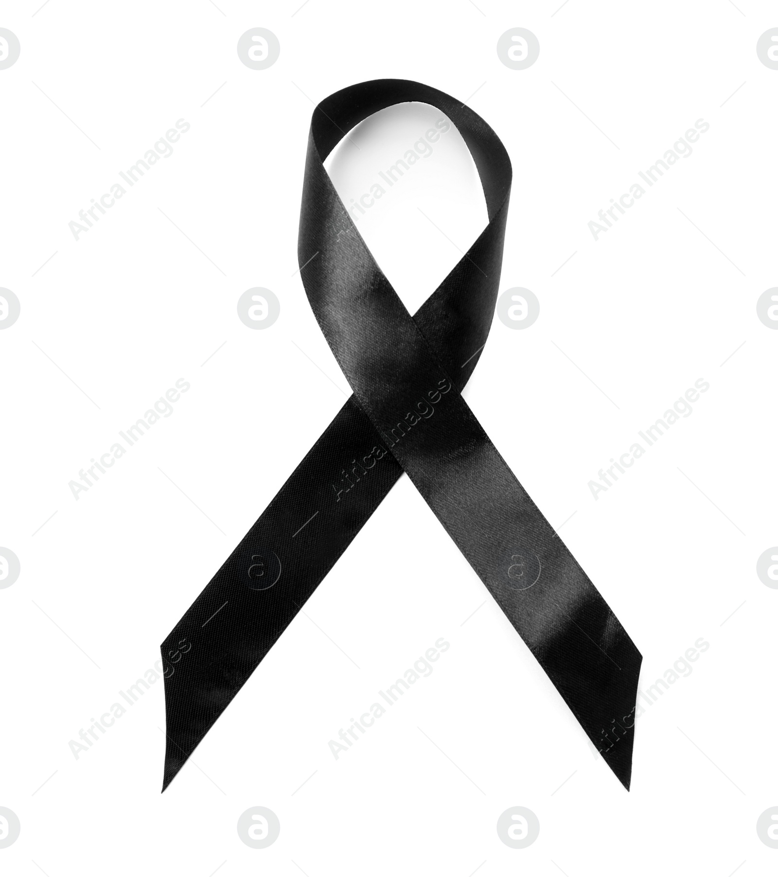 Photo of Black ribbon on white background, top view. Funeral symbol