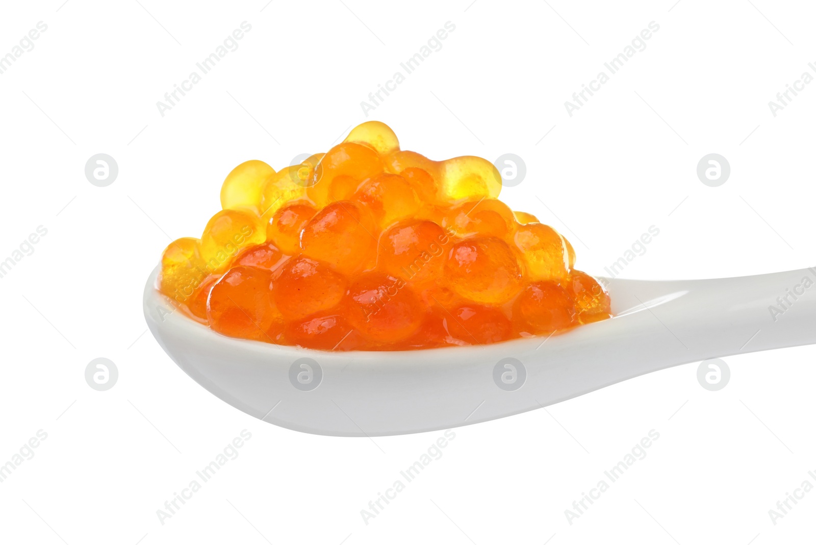 Photo of Spoon with delicious red caviar isolated on white, closeup