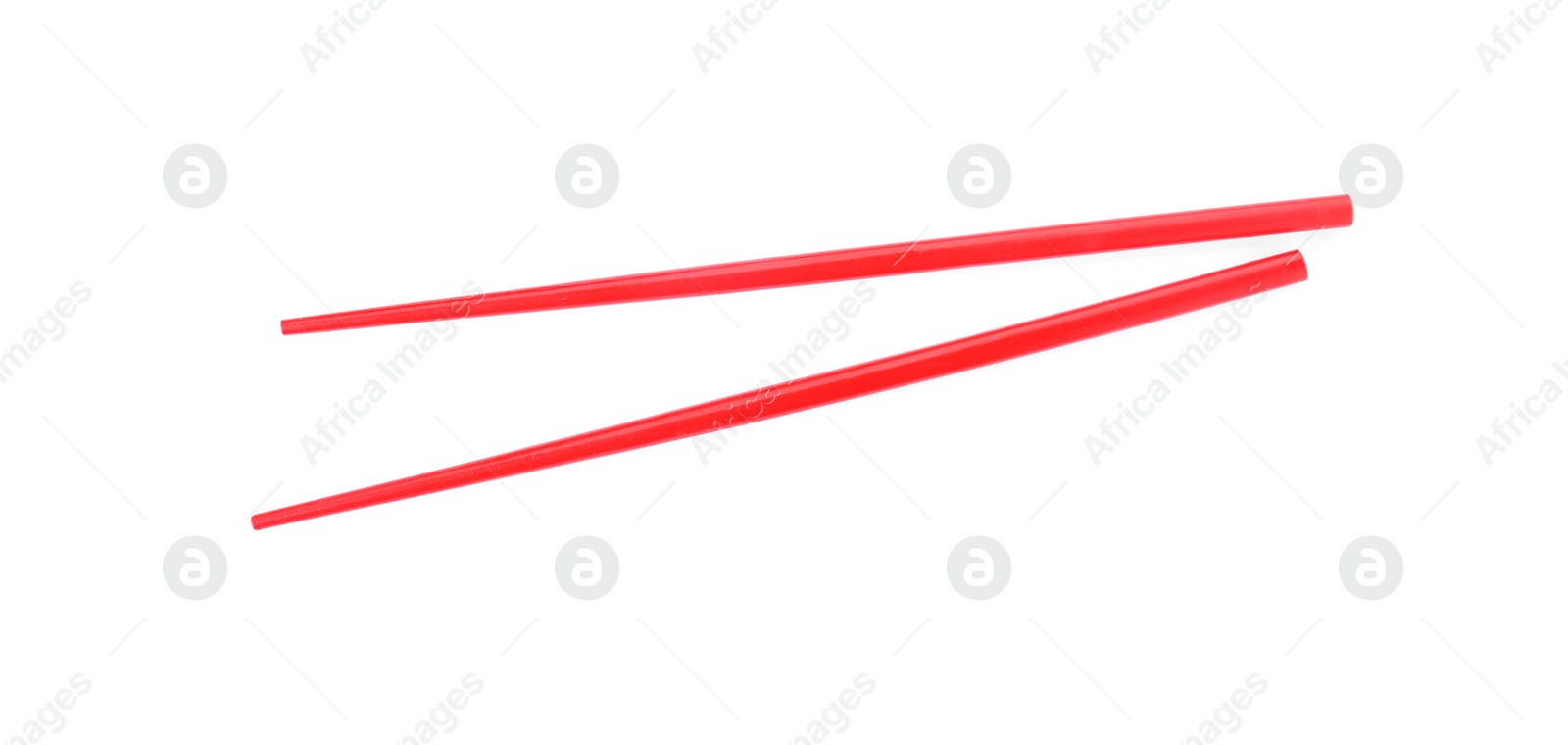 Photo of Pair of red chopsticks isolated on white, top view