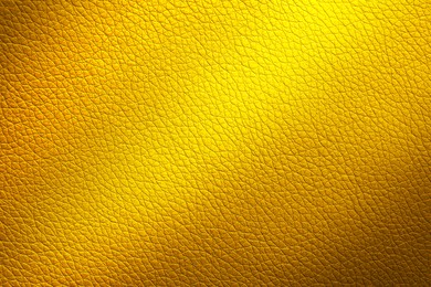 Image of Golden textured surface as background, closeup view