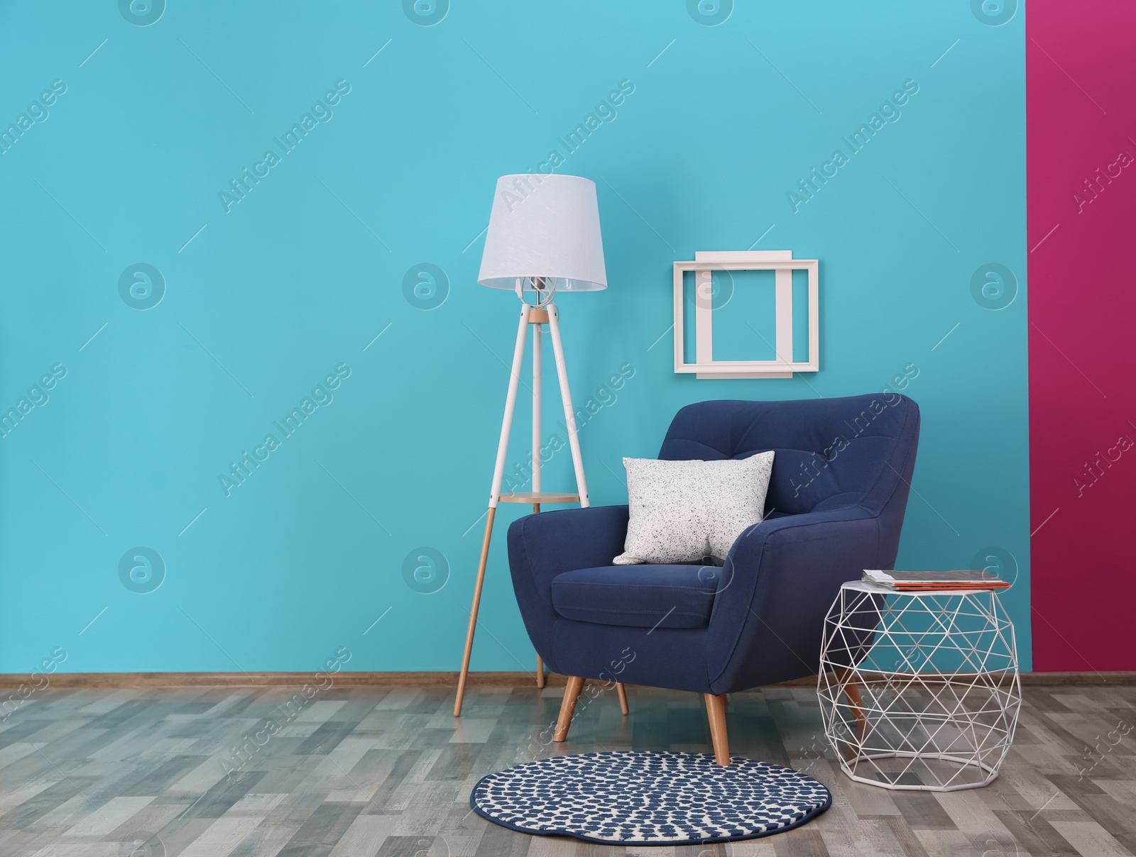 Photo of Modern bright interior with comfortable blue armchair