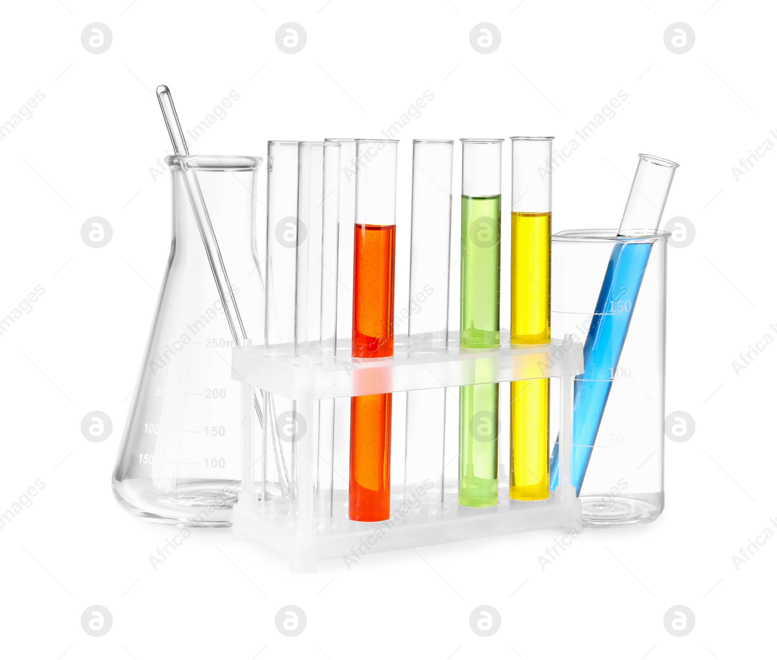 Photo of Glass flask, beaker and test tubes with colorful liquids isolated on white