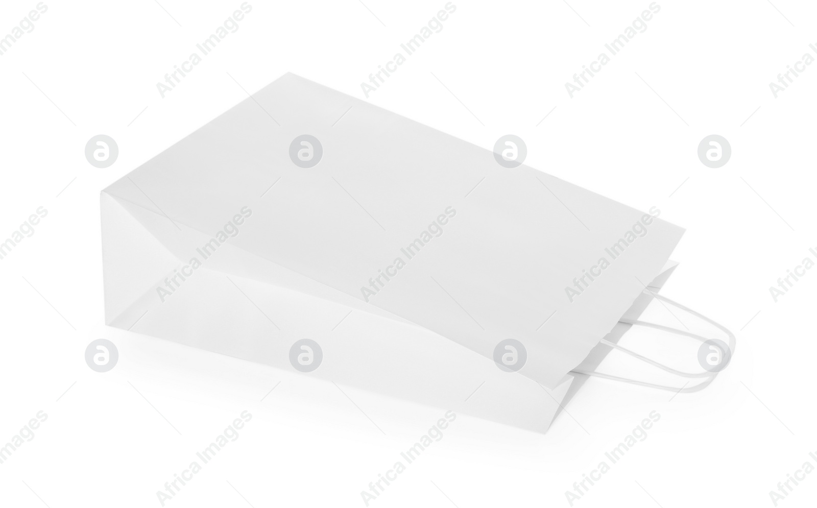 Photo of One paper shopping bag isolated on white