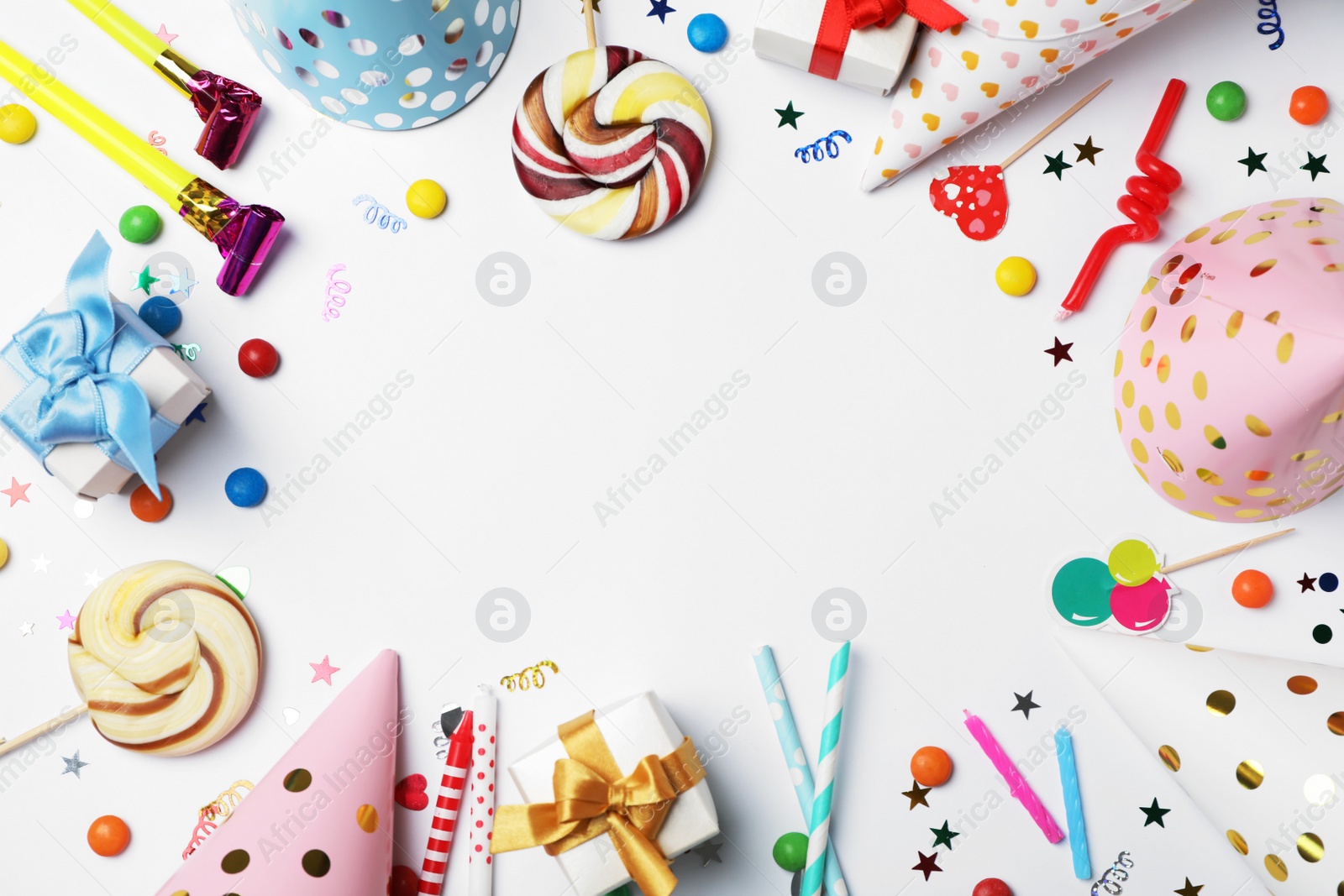 Photo of Flat lay composition with birthday party items on light background