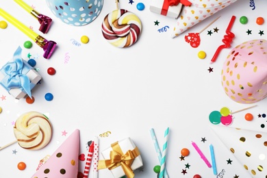 Photo of Flat lay composition with birthday party items on light background