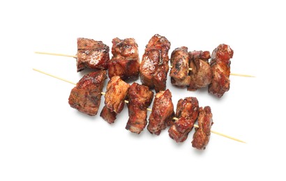 Photo of Delicious shish kebabs isolated on white, top view