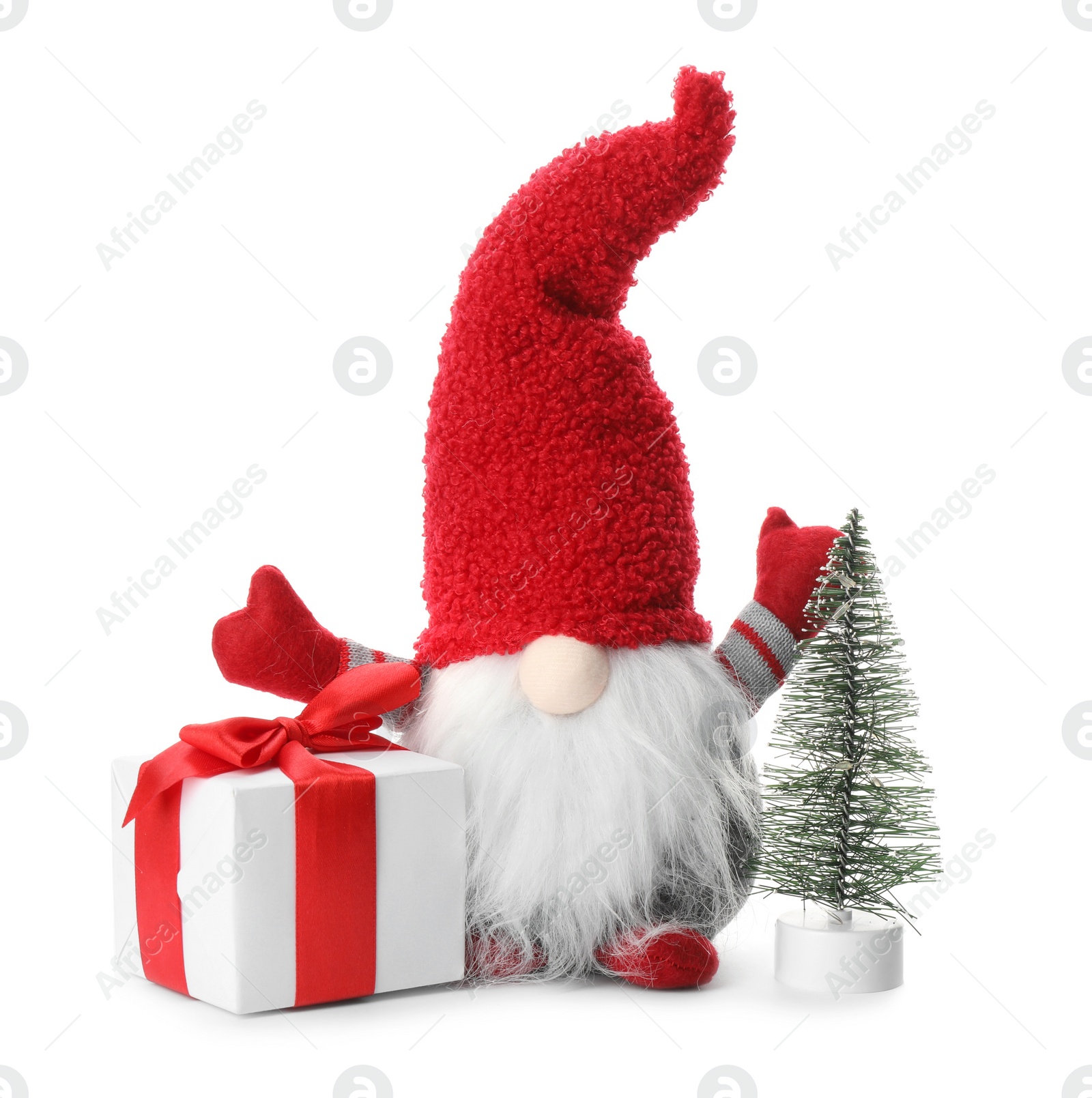 Photo of Funny Christmas gnome with tree and gift box on white background