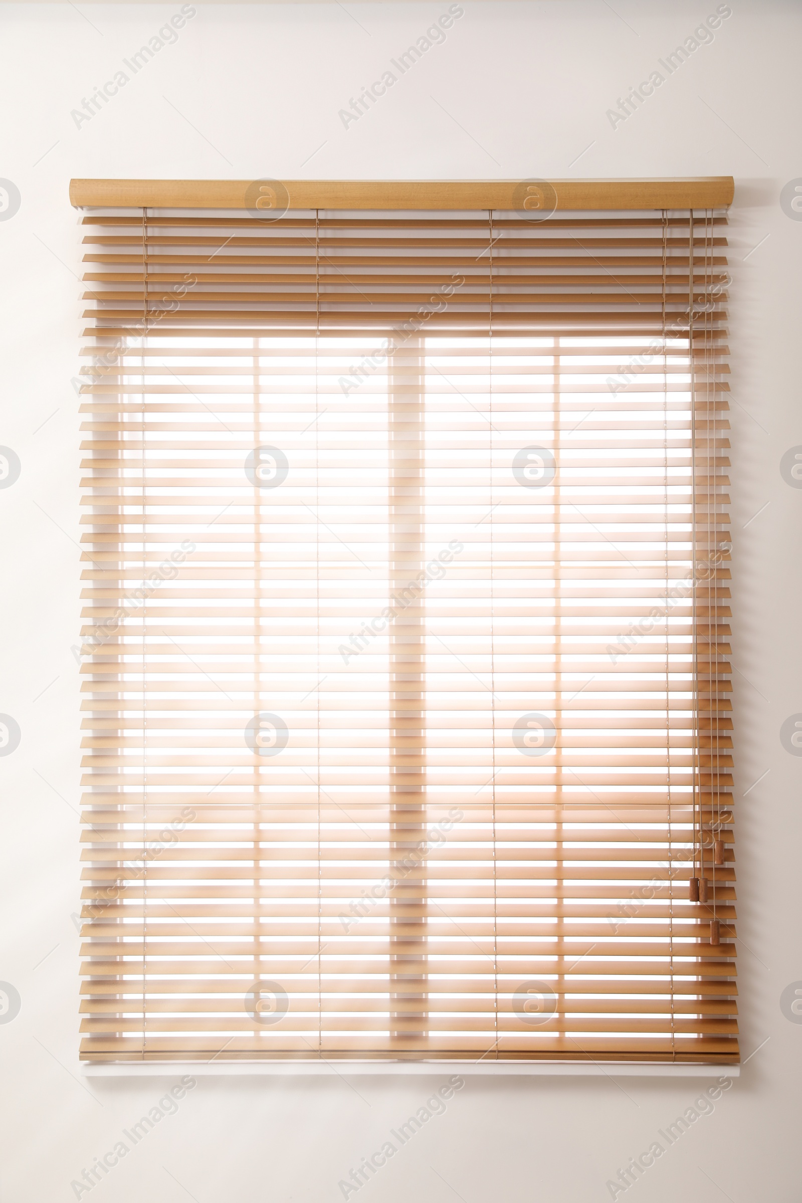 Photo of Modern window with open wooden blinds indoors