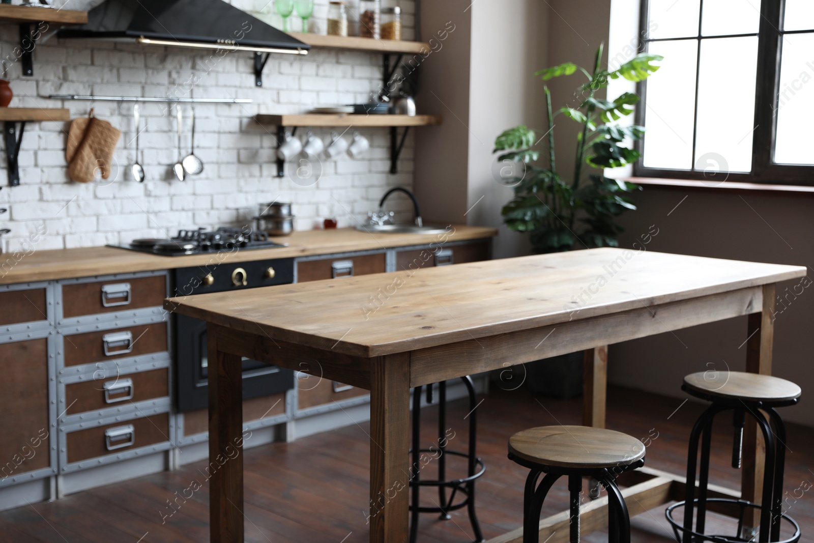 Photo of Beautiful kitchen interior with new stylish furniture