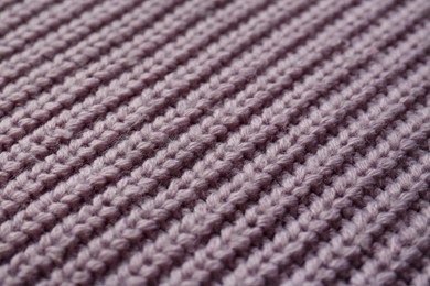 Photo of Beautiful violet knitted fabric as background, closeup