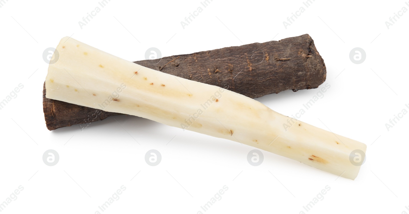 Photo of Cut raw salsify roots isolated on white