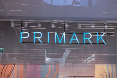 Photo of WARSAW, POLAND - AUGUST 05, 2022: Signboard of Primark clothing store in shopping mall