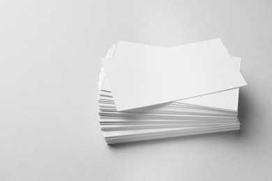 Blank business cards on white background. Mockup for design