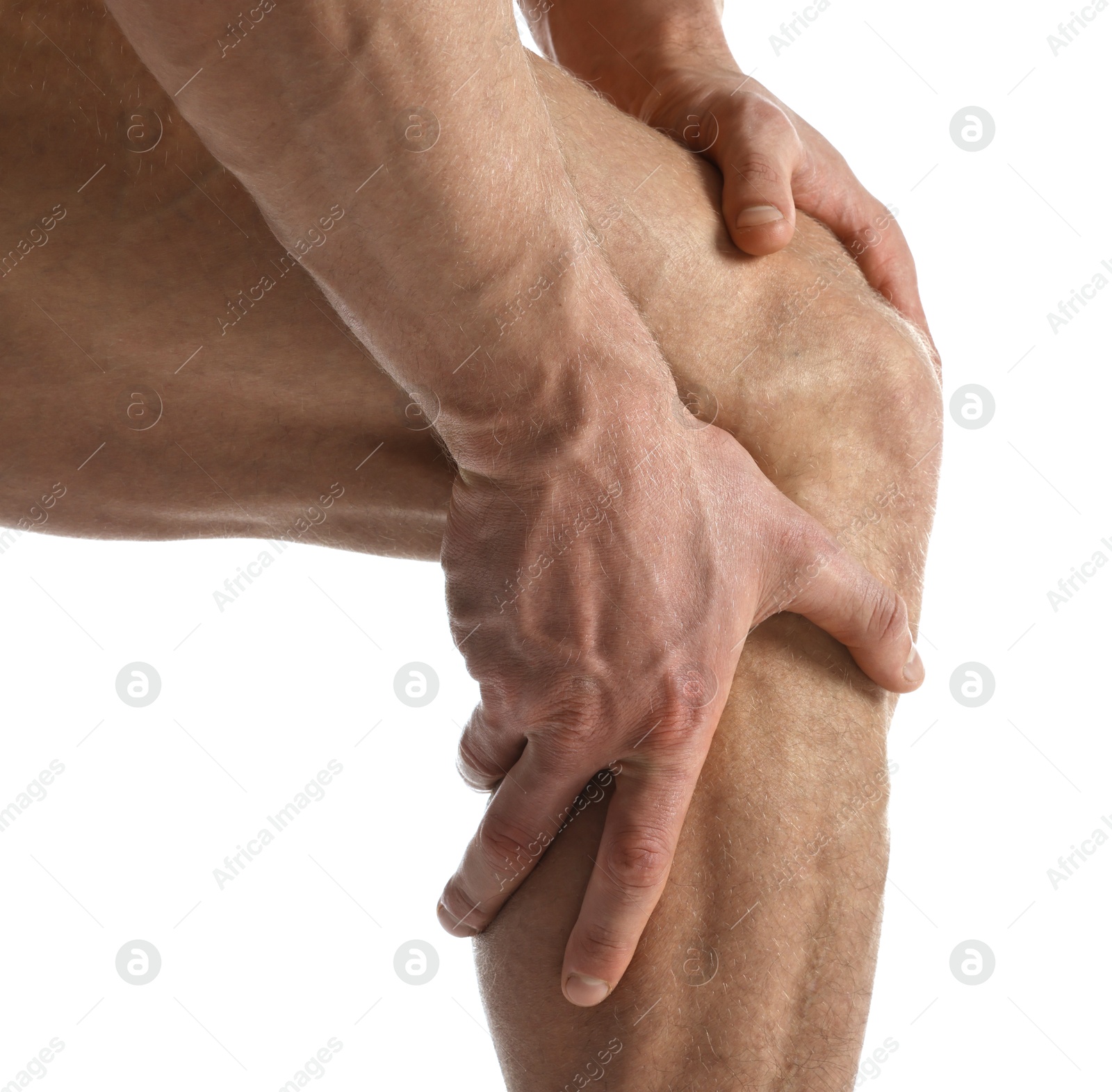 Photo of Man with muscular legs on white background, closeup