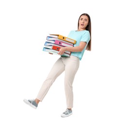 Photo of Stressful woman with folders walking on white background