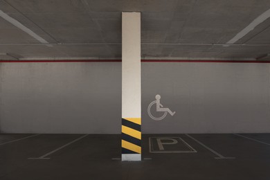 Image of Car parking garage with wheelchair symbol 