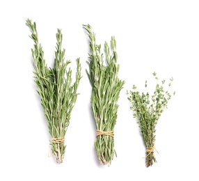 Photo of Rosemary and thyme on white background, top view. Aromatic herbs