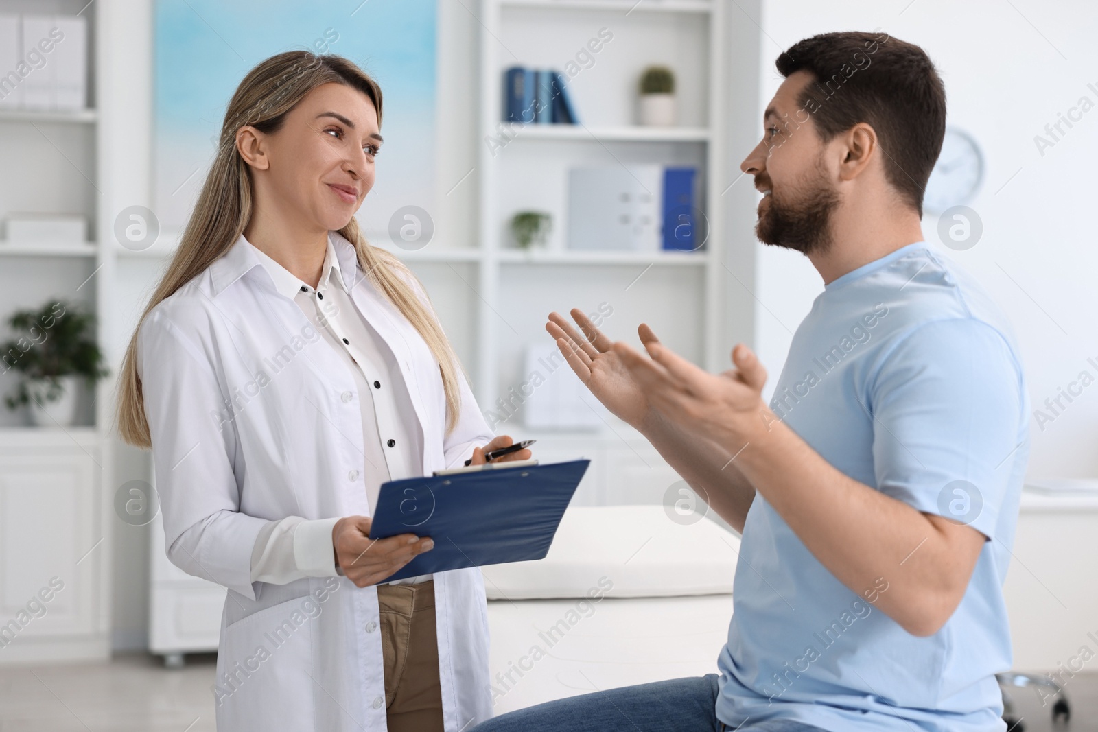 Photo of Professional doctor working with patient in hospital