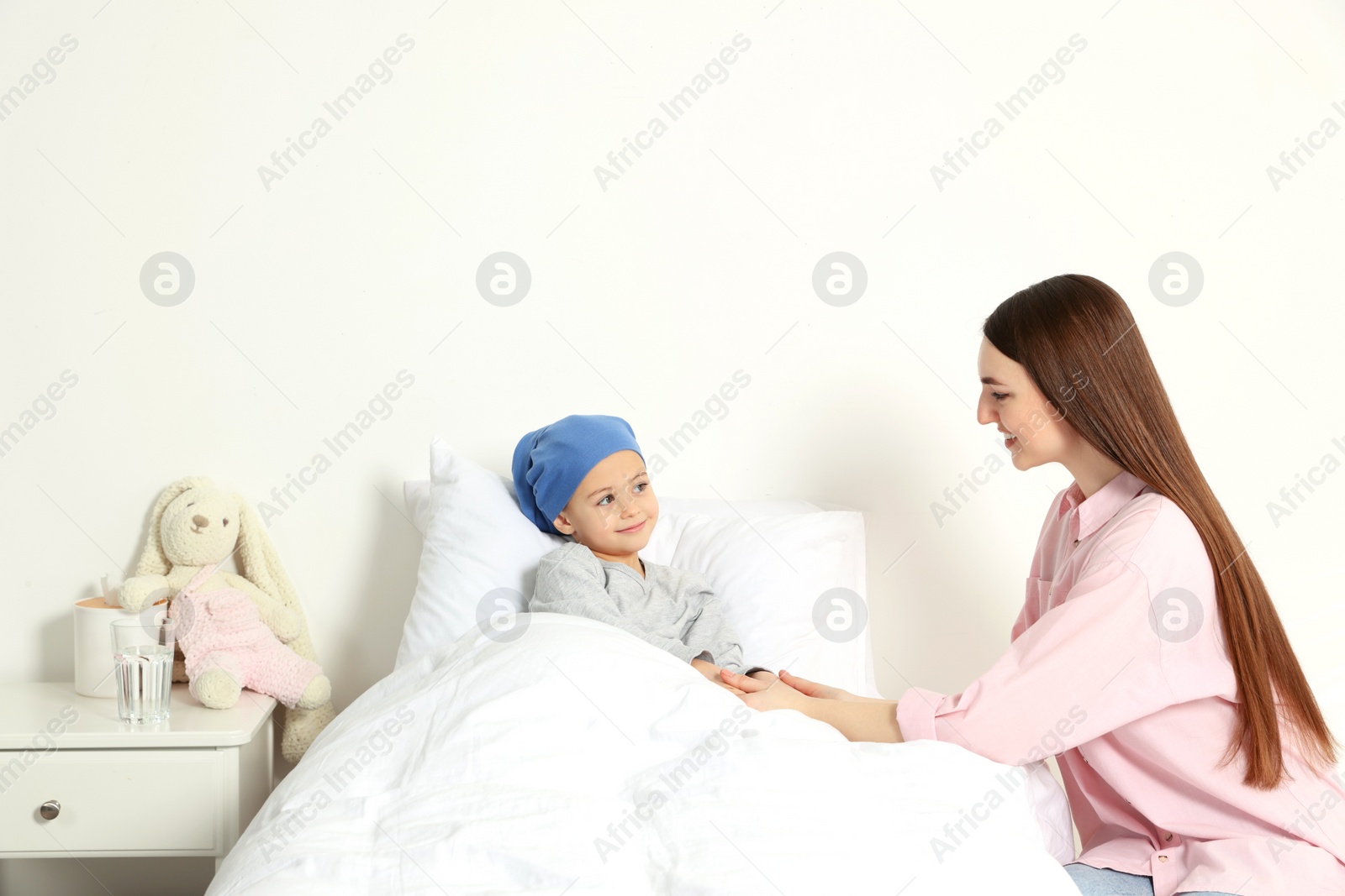 Photo of Childhood cancer. Mother and daughter in hospital