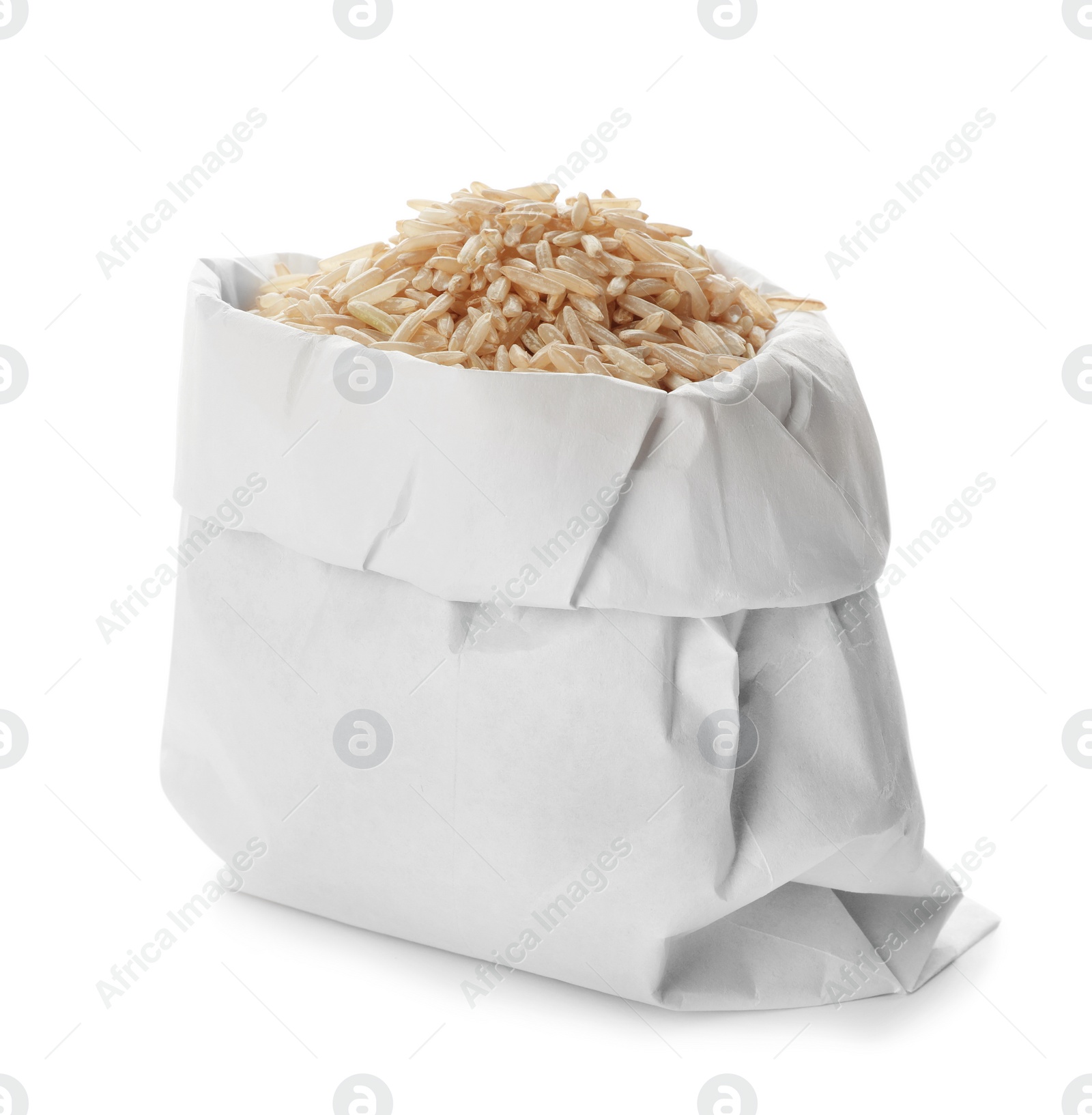 Photo of Bag with brown rice on white background