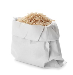 Photo of Bag with brown rice on white background