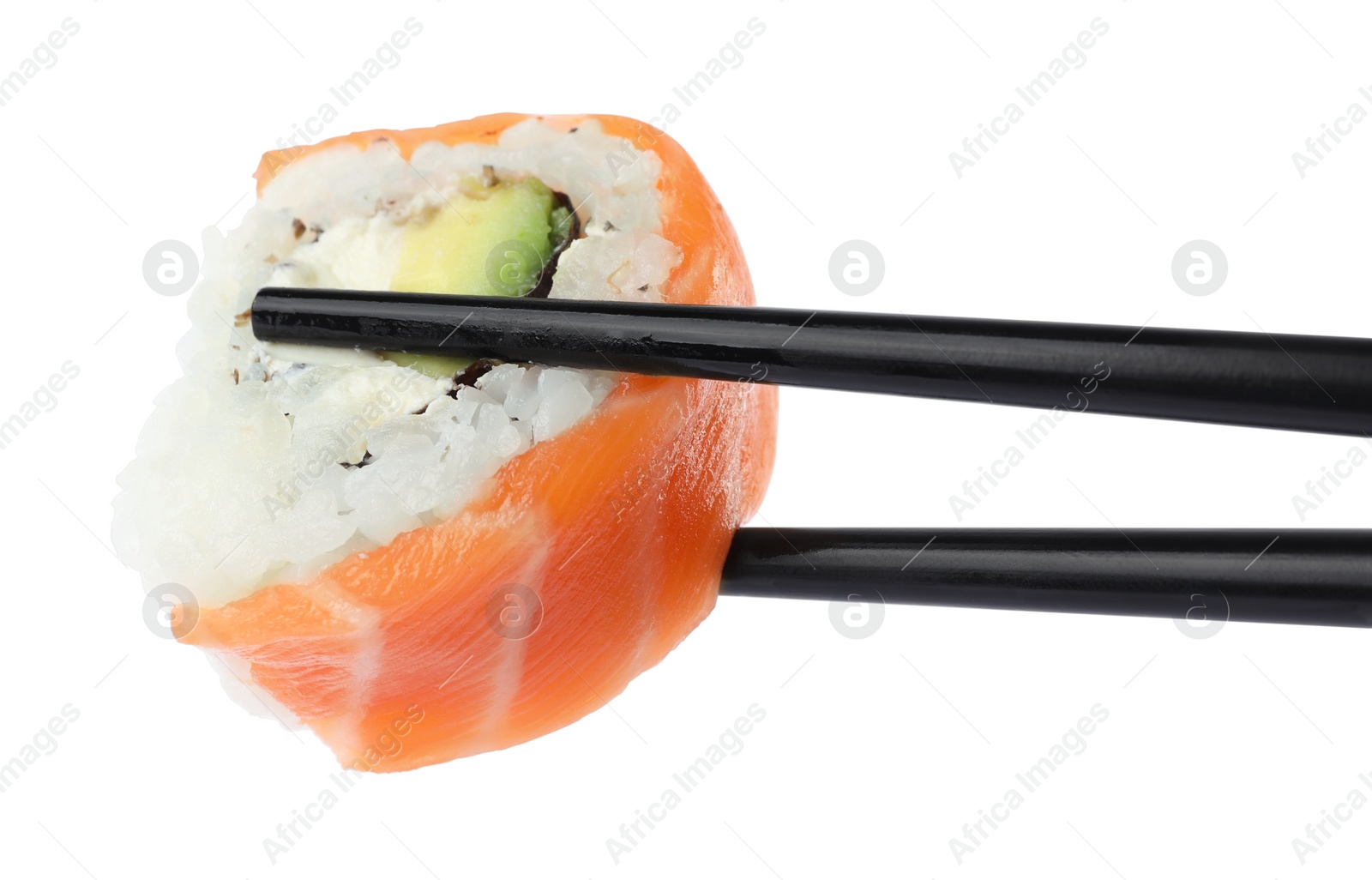 Photo of Chopsticks with delicious fresh sushi roll isolated on white