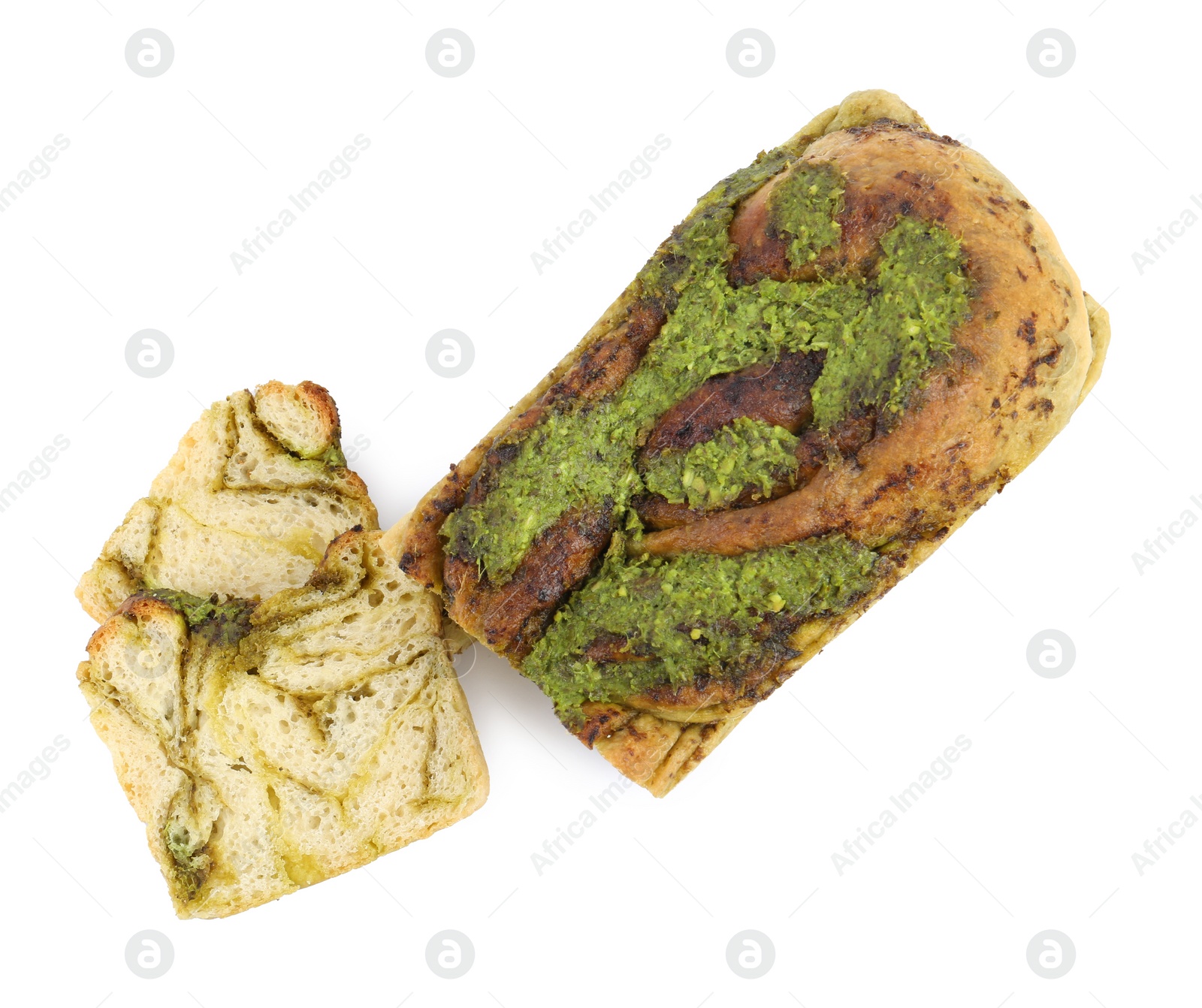 Photo of Freshly baked pesto bread isolated on white, top view