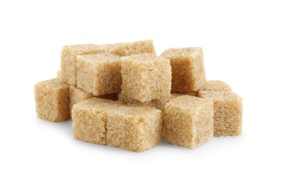 Photo of Many brown sugar cubes isolated on white