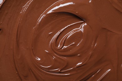 Tasty chocolate paste as background, closeup view